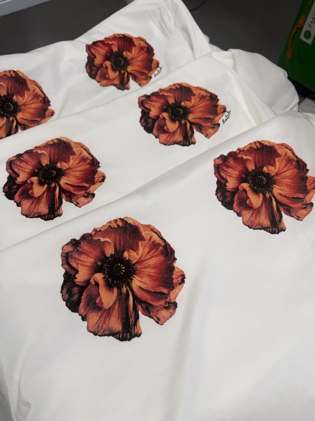 Stack of printed tees ready to go out